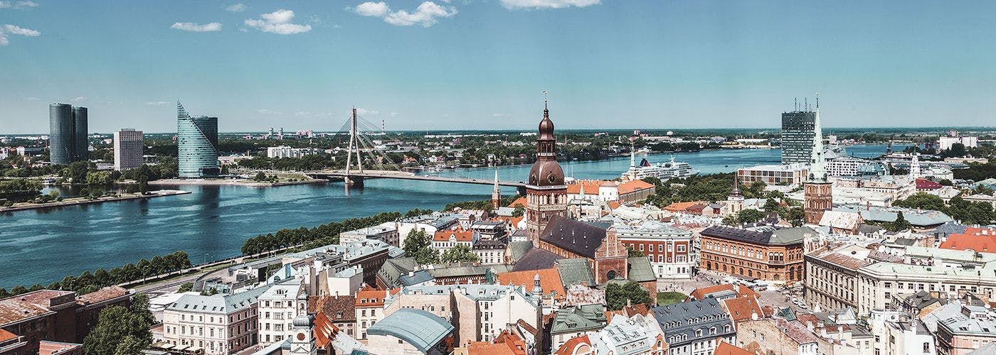 A panoramic view of Riga, Latvia, showcasing the urban landscape, ideal for VPS hosting services due to its strategic location and connectivity.