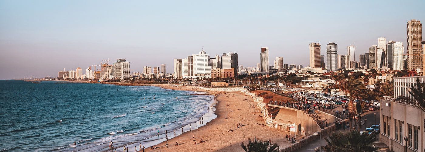 Tel Aviv's shoreline with modern architecture, home to Israel's top VPS hosting, servers locate at Shacham Data Center