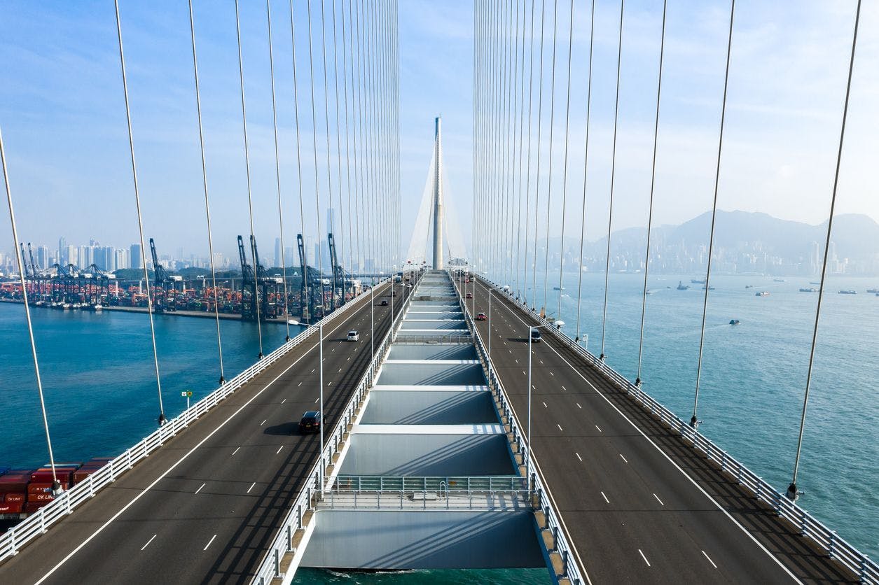 The expansive Stonecutters Bridge spanning the Tsing Sha Highway in Hong Kong, symbolizing the robust connections of EDIS Global VPS Hosting