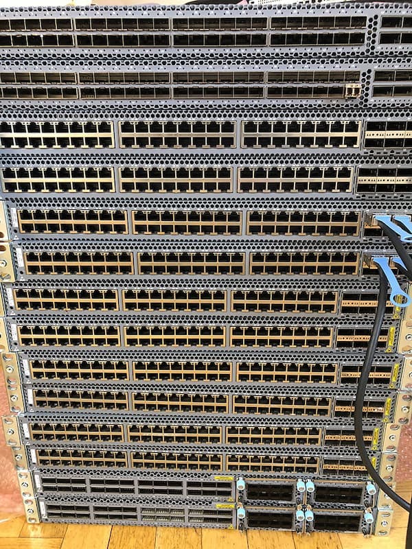 Rack of Juniper switches equipped with 10G ports for high-speed VPS hosting