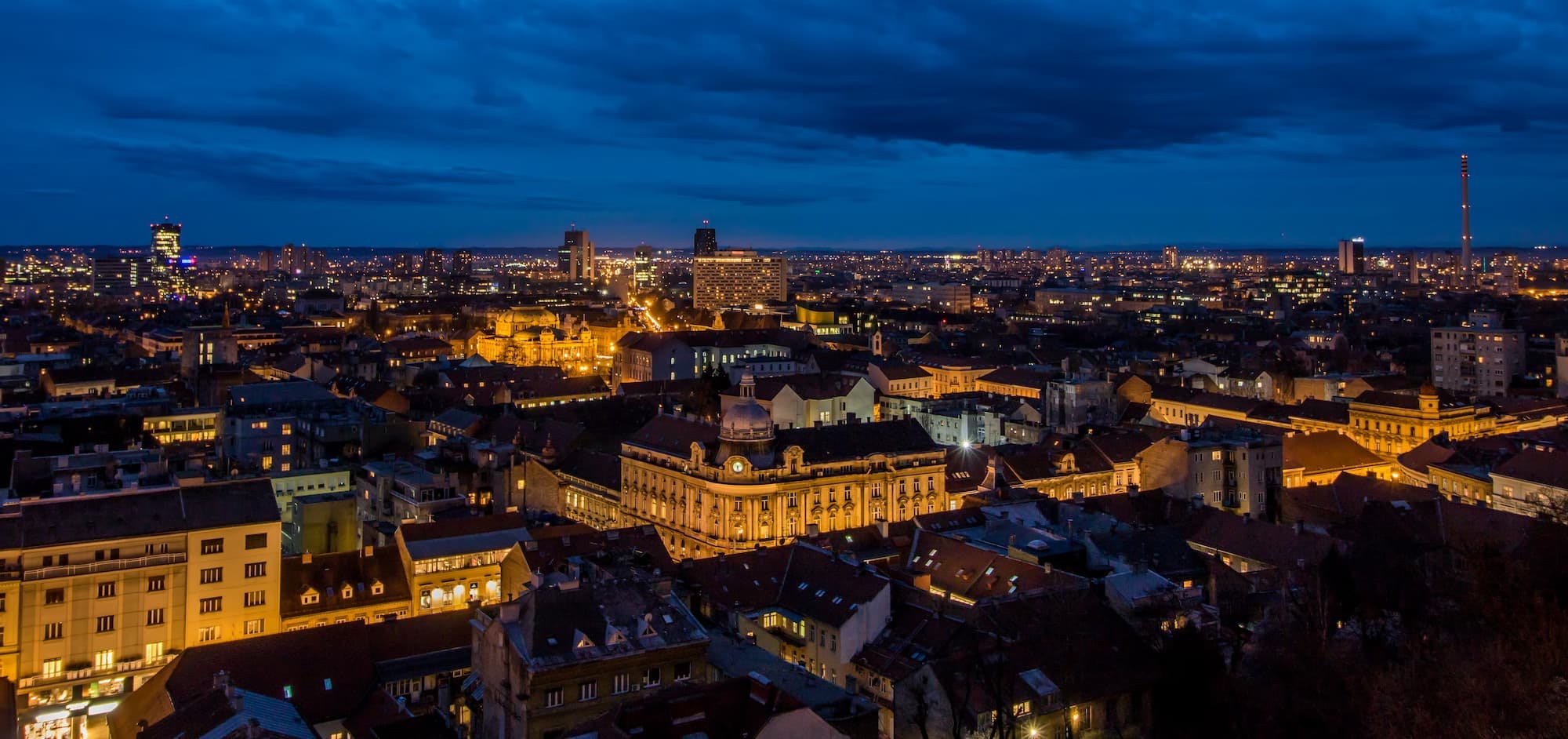 Nighttime panorama of Zagreb, Croatia, with city lights reflecting the potential for VPS hosting services